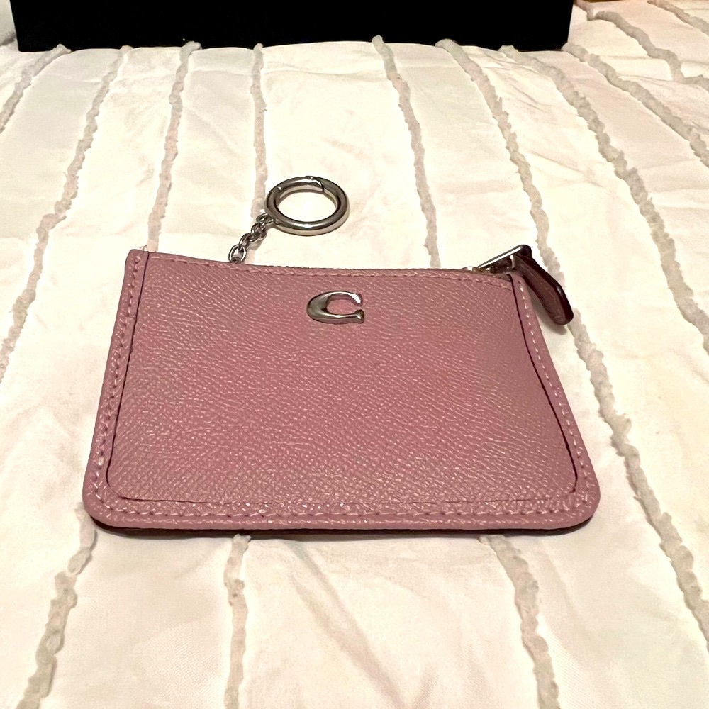 Coach wallet with a key chain pink with silver hardware